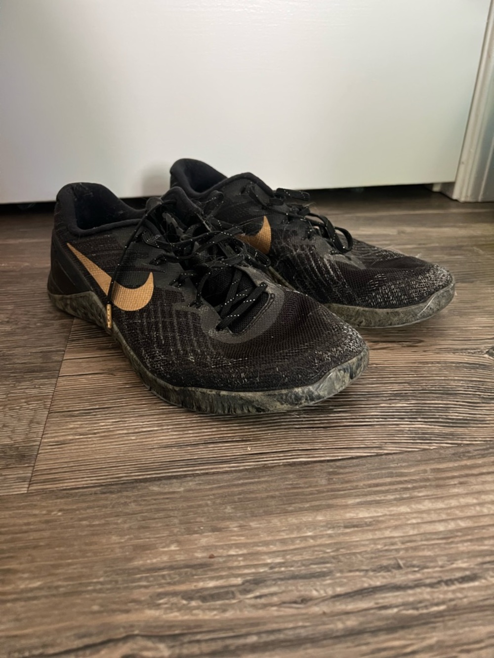 Metcons Nike Black and Gold Training Shoes